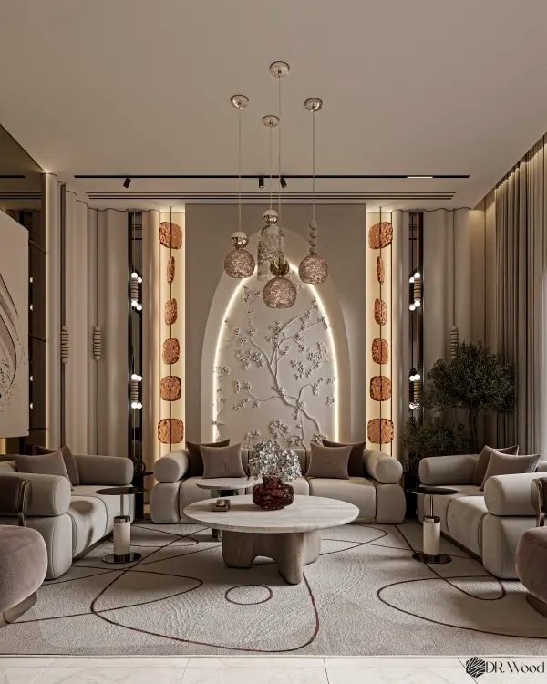 Elegant contemporary majlis interior with curved seating, neutral tones, sculptural lighting, and a textured illuminated feature wall creating a warm luxurious ambiance